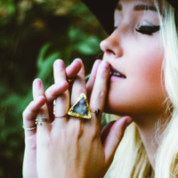 women wearing rings with geometric shapes